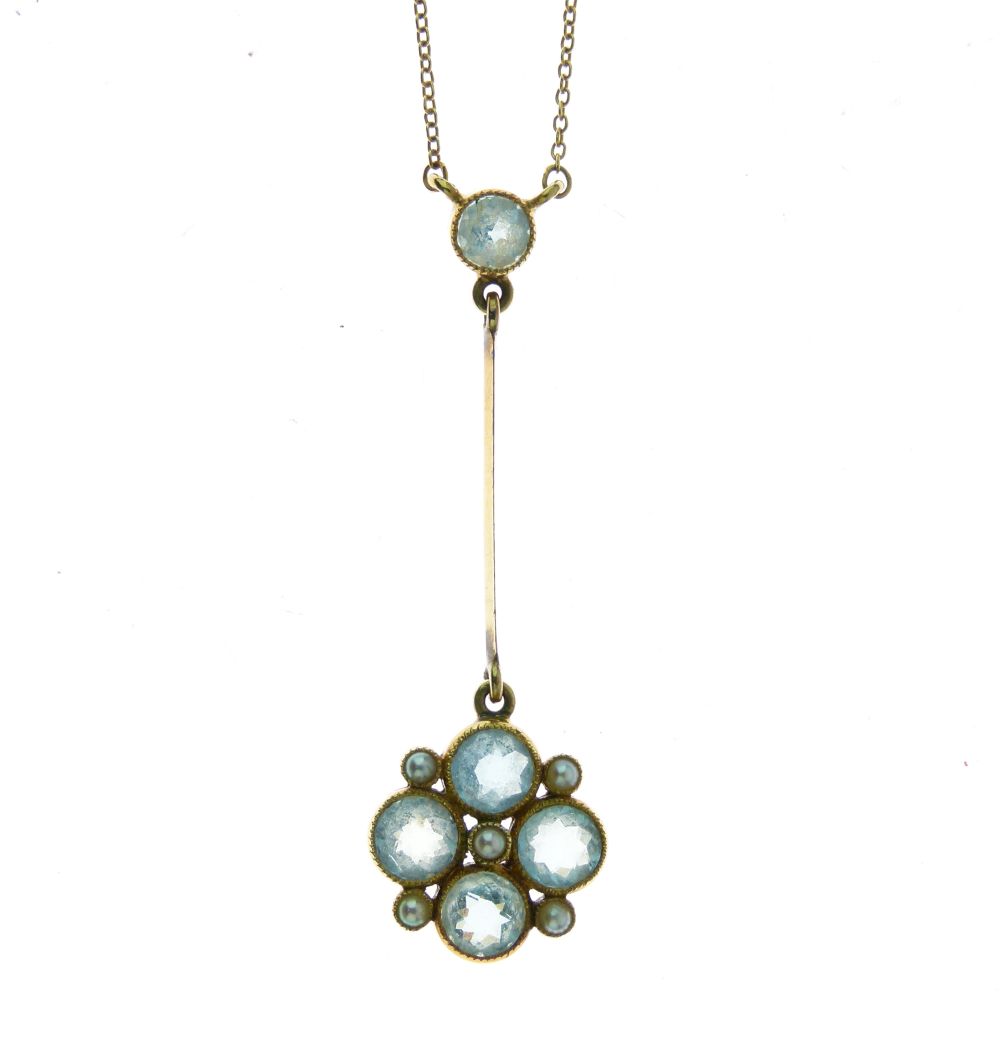 Edwardian aquamarine and seed pearl cluster pendant, tagged '15', on a knife edge suspension to an