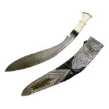 Silver mounted Nepalese Kukri, late 19th Century, with single edged leaf shaped blade with two