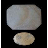 Two Middle Eastern carved agate plaques or amulets, both etched with Arabic script, the larger