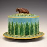 Victorian George Jones majolica cheese dome and stand, modelled as a recumbent cow within rope twist
