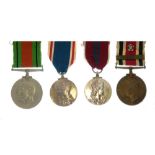 British Medal Group awarded to Inspector Edward Thomas comprising of World War II Defence Medal,