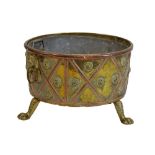 Unusual 19th Century brass and copper log bin or jardiniere, of circular form with lion mask