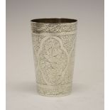 Indian white metal beaker of tapering cylindrical form decorated with quatrefoil panels of