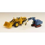 Two West German NZG Modelle die-cast construction models comprising: Caterpillar 988 Digger and