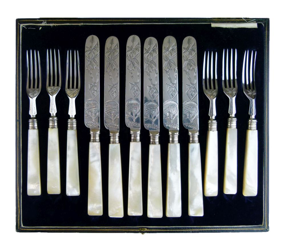 Cased set of six late Victorian mother-of-pearl handled silver fruit knives and forks, in the