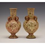 Pair of Hispano/Moresque lustre pottery vases, each of bulbous form with four strap handles to