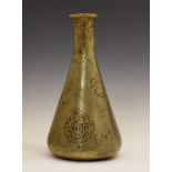 Middle Eastern brass vessel of conical form with tall neck, the whole decorated with panels of
