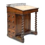19th Century rosewood Davenport, with three-quarter balustrade over blind-tooled tan leather