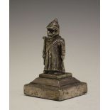 Cast base metal figure of a Prussian soldier, probably Victorian, modelled in standing pose