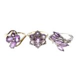 Two 9ct gold dress rings set purple stone, together with a similar white metal dress ring stamped