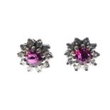 Pair of unmarked white metal, ruby and diamond ear studs (lacking keepers), 3.2g gross approx