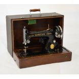 Cased Singer sewing machine