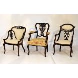 Three early 20th Century salon armchairs