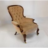 Victorian walnut framed scroll arm salon chair having button back mushroom coloured upholstery,