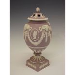 Wedgwood lilac jasperware pot pourri decorated with swags and rams heads, 30.5cm high