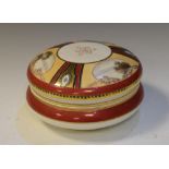 Noritake porcelain circular box and cover decorated with three oval landscape panels, 18cm diameter