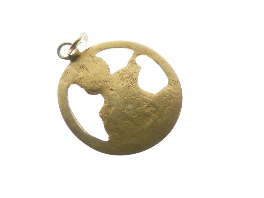 Unmarked yellow metal pendant, cast as an elephant standing before a palm tree, together with a - Image 3 of 4