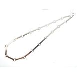 Silver Modernist-style necklace of eighteen rectangular box-section links, 72.3g approx