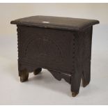 Oak six plank chest having carved front and hinged cover, 43cm wide