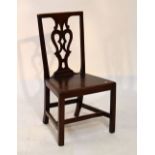 Chippendale-style mahogany dining chair with solid seat