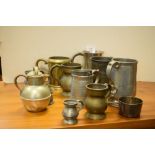 Assorted pewter and other measures to include; 1 pint mug with Victorian Excise stamps, etc (14)
