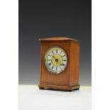 Early 20th Century Hamburg American Clock Co fruitwood-cased mantel clock with crossed arrows