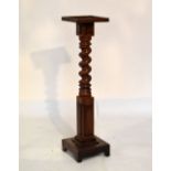 Early 20th Century mahogany torchère/jardinière stand on square base, 125cm high