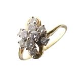 18ct gold and diamond cluster ring, in Modernist style set with ten small brilliants in a tiered