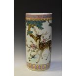 Oriental porcelain cylindrical umbrella stand, decorated with deer amongst pine trees, 45cm high