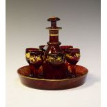 19th Century ruby glass liqueur set comprising: gilt-enriched bottle, six liqueur glasses and