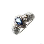 Yellow metal, sapphire and diamond dress ring, the pendeloque-cut sapphire enclosed by marquise
