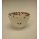 18th Century Bristol porcelain spirally-fluted tea bowl inscribed '99' beneath, 8.5cm diameter x 5.