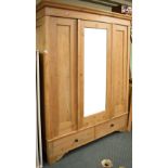 Victorian stripped pine wardrobe fitted single mirror panel door with two drawers to the base, 146cm