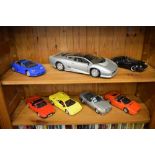 Seven 1-18 scale Maisto Mira die-cast model sports cars to include Ferrari 348TS, Porsche 911
