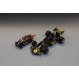 Two vintage Corgi die-cast model vehicles comprising Chitty Chitty Bang Bang and John Player Special
