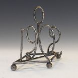 Hukin & Heath - Edward VII silver toast rack, the divisions forming the year 1902, on four ball