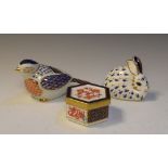 Two Royal Crown Derby paperweights, a bird and a rabbit, together with a hexagonal box and cover (3)