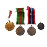 British Second World War Medal Pair comprising Defence Medal and War Medal, both on ribbon, together