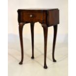 Early 20th Century walnut drop-leaf occasional table with bow-breakfront and frieze drawer on