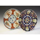 Two Imari chargers, having iron red and underglaze blue decoration, both approximately 37cm diameter