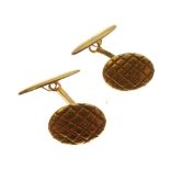 Pair of unmarked yellow metal cufflinks of oval design with lattice decoration, 6.9g gross approx