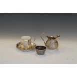 Indian white metal cream jug and tea bowl, together with a late Victorian patent tea cup, the