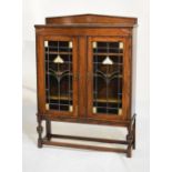 1930's period oak and leaded glass cabinet fitted two doors, 98cm wide