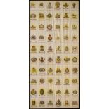 Printed silk sheet of G.P. Territorial badges, 68cm x 28cm, framed and glazed