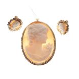 20th Century yellow metal shell cameo brooch and pair of matching ear studs, each stamped k14, 15.7g