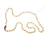 Cultured pearl necklace by Lotus, with 9ct gold clasp, in original box
