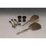 Assorted small silver to include; dressing mirror and brush pair of egg cups, and assorted spoons,