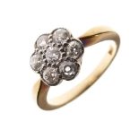 Yellow metal and diamond cluster ring of seven stone design, shank stamped 18ct, size L, 3.4g