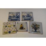 Pair of 18th Century Delftware tiles depicting waterside buildings, 13cm square, together with two