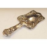 Edward VII silver hand mirror in the Art Nouveau taste with repoussé 'whiplash' decoration of